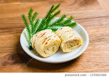 Delicious boiled yuba: an elegant Japanese side dish used in New Year's osechi cuisine 135002480