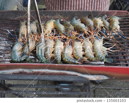 Grilled shrimp seafood street food barbecue cooking grill prawn fresh outdoor flame grilled seafood skewer shellfish market Grilled shrimp seafood street food barbecue cooking grill prawn fresh outdoor flame grilled seafood skewer shellfish market 135003103