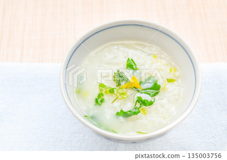 Rice porridge with seven herbs in a bowl 135003756