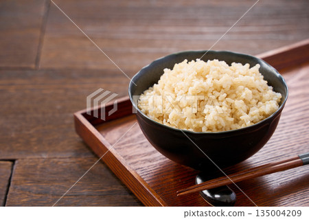 Brown rice served in a bowl 135004209