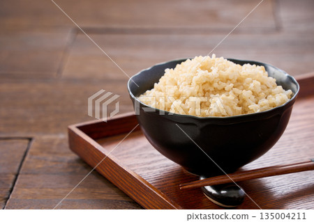 Brown rice served in a bowl Brown rice served in a bowl 135004211
