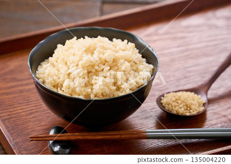 Brown rice served in a bowl Brown rice served in a bowl 135004220