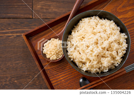 Brown rice served in a bowl Brown rice served in a bowl 135004226