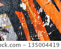 Abstract Grunge Street Art with Peeling Paint in Orange, Black, White for 90s Urban Style 135004419