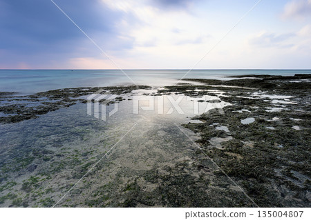 Beautiful coastal sunset, Okinawa scenery, Kanai Beach Beautiful coastal sunset, Okinawa scenery, Kanai Beach 135004807