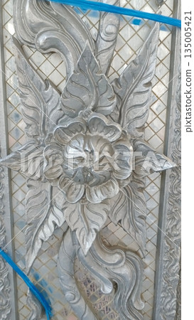 broken egg in grass 135005421