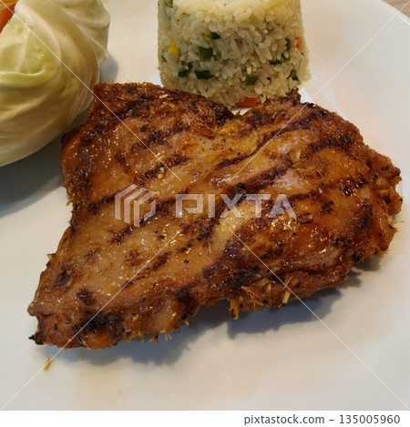Close-up of succulent grilled marinated pork neck slice 135005960