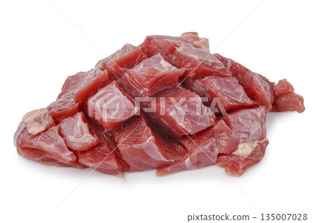 Raw beef stew meat, pre cut into lean chunks isolated on a white background Raw beef stew meat, pre cut into lean chunks isolated on a white background 135007028