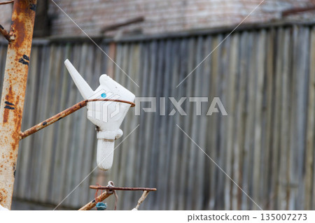 Abandoned old toy in the ghost town Pripyat in Chernobyl Exclusion Zone, Ukraine Abandoned old toy in the ghost town Pripyat in Chernobyl Exclusion Zone, Ukraine 135007273