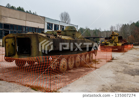 Old rusty abandoned military vehicle in Chernobyl exclusion zone, Ukraine Old rusty abandoned military vehicle in Chernobyl exclusion zone, Ukraine 135007274