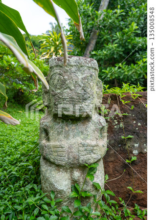 Tiki statue at the queen tomb in Puamau, Hiva Oa, French Polynesia Tiki statue at the queen tomb in Puamau, Hiva Oa, French Polynesia 135008548