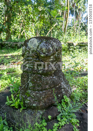 Ancient tiki statue at Kamuihei archaeological site, Nuku Hiva, Marquesas Islands. French Polynesia Ancient tiki statue at Kamuihei archaeological site, Nuku Hiva, Marquesas Islands. French Polynesia 135008558