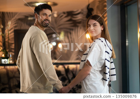 Couple in the hotel ready for check in Couple in the hotel ready for check in 135009876