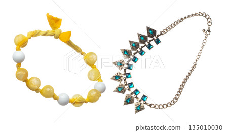Crystal jewel bead style necklet fly in air. Crystal Jewelry bead necklace as gemstone for fashion ornament decorative items. Fashion ornament necklace to add more style. White background isolated Crystal jewel bead style necklet fly in air. Crystal Jewelry bead necklace as gemstone for fashion ornament decorative items. Fashion ornament necklace to add more style. White background isolated 135010030