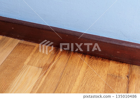 A floor rotting from dampness with black spots on the decaying surface A floor rotting from dampness with black spots on the decaying surface 135010486