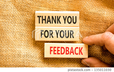 Thank you for your feedback symbol. Concept words Thank you for your feedback on beautiful wooden blocks. Beautiful canvas background. Business thank you for your feedback concept. Copy space. 135011030