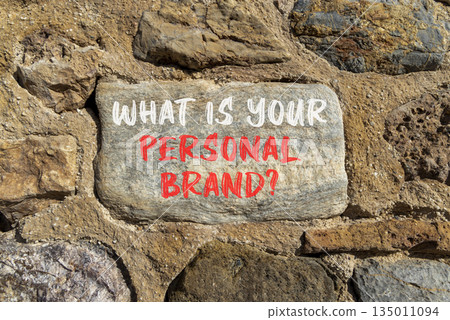 What is your personal brand symbol. Concept words What is your personal brand on beautiful grey stone. Beautiful stone wall background. Business what is your personal brand concept. Copy space. 135011094