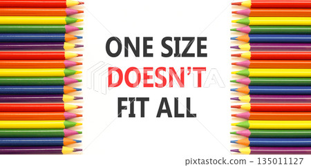One size does not fit all symbol. Concept words One size does not fit all on beautiful white paper. Beautiful white background. Colored pencils. Business one size does not fit all concept. Copy space. 135011127