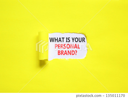 What is your personal brand symbol. Concept words What is your personal brand on beautiful white paper. Beautiful yellow paper background. Business what is your personal brand concept. Copy space. 135011170
