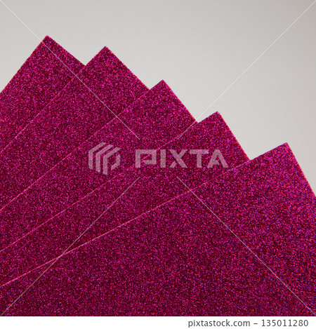 Raspberry, dark pink glitter craft foam sheets background. Raspberry, dark pink glitter craft foam sheets background. 135011280