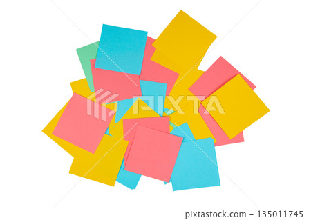 Colored sheets of note paper on a white background. 135011745