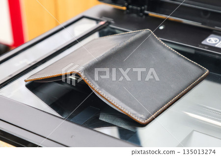 Copying Passport Pages at a Document Copy Center Office Administrative Service Copying Passport Pages at a Document Copy Center Office Administrative Service 135013274