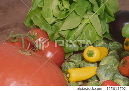Close-up of various vegetables in a cozy kitchen setting Close-up of various vegetables in a cozy kitchen setting 135013702