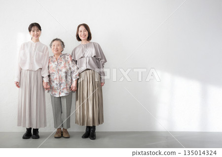Full-body portrait of a three-generation family woman 135014324