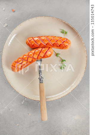 Grilled sausages on plate with herbs, top view, copy space Grilled sausages on plate with herbs, top view, copy space 135014743