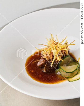 Gourmet tasting dish showcasing expertly prepared beef and vegetables Gourmet tasting dish showcasing expertly prepared beef and vegetables 135015539