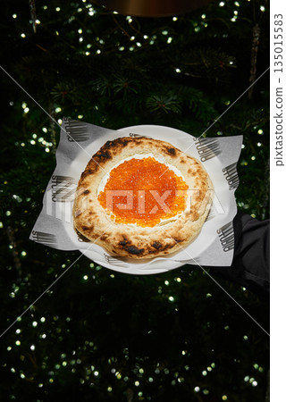 Visually Enticing Pizza Photograph Showcasing Glossy Toppings And Atmospheric Gardeninspired Lighting Effects 135015583