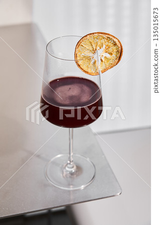 Exquisite Red Cocktail Arranged On Elegant Marble Surface With Artistic Styling Suitable For Upscale Menus Exquisite Red Cocktail Arranged On Elegant Marble Surface With Artistic Styling Suitable For Upscale Menus 135015673