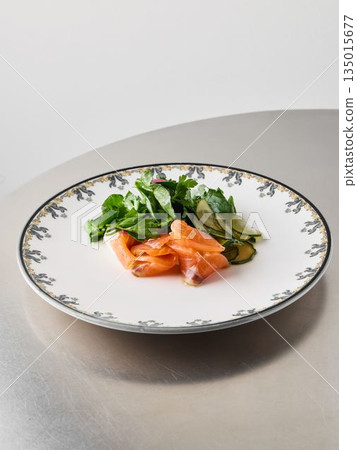 Vibrant brunch display featuring smoked salmon and crisp vegetables Vibrant brunch display featuring smoked salmon and crisp vegetables 135015677