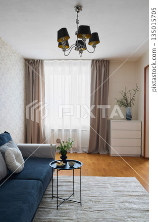 Charming sitting room with layered textiles and ambient lighting Charming sitting room with layered textiles and ambient lighting 135015705