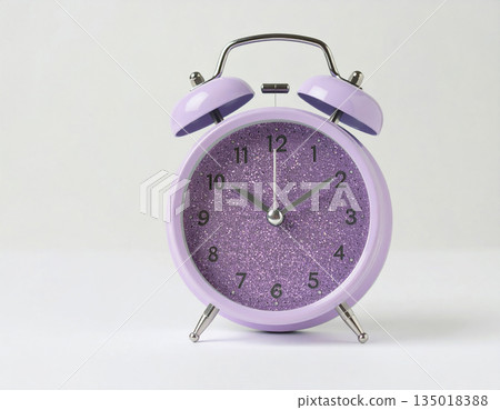 Minimalist decor. Purple vintage alarm clock on background in pastel color with copy space. Bright design. Minimalist decor. Purple vintage alarm clock on background in pastel color with copy space. Bright design. 135018388