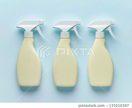 Commercial use. Yellow sprays in a row. Disinfectant, glass cleaner, all-purpose surface cleaner. Mockup for branding cleaning product. Commercial use. Yellow sprays in a row. Disinfectant, glass cleaner, all-purpose surface cleaner. Mockup for branding cleaning product. 135018397