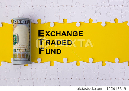 Etf exchange traded fund concept with money and puzzle 135018849