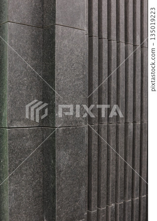 Dark granite fa ade textural pattern abstract architecture Dark granite fa ade textural pattern abstract architecture 135019223