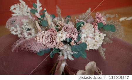 Beautiful modern wedding bouquet. Wedding bouquet of the bride. Beautiful modern wedding bouquet. Wedding bouquet of the bride. 135019247