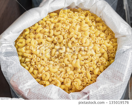 Bulk pasta at a grocery supermarket, dry bulk pasta at a grocery store 135019576