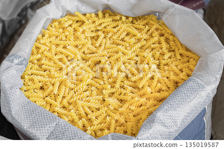 Bulk pasta at a grocery supermarket, dry bulk pasta at a grocery store Bulk pasta at a grocery supermarket, dry bulk pasta at a grocery store 135019587