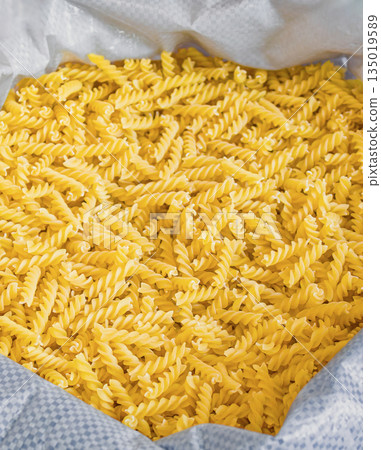 Bulk pasta at a grocery supermarket, dry bulk pasta at a grocery store Bulk pasta at a grocery supermarket, dry bulk pasta at a grocery store 135019589