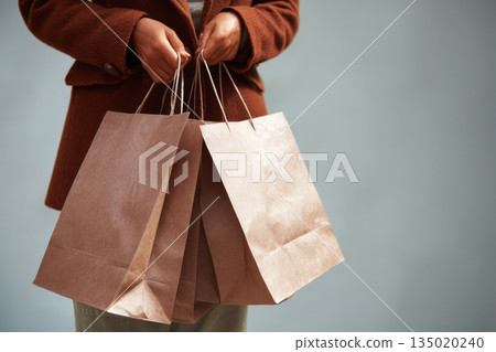 Beautiful woman shopping in supermarket and deciding what to buy, generated AI Beautiful woman shopping in supermarket and deciding what to buy, generated AI 135020240