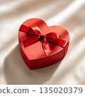 red heart shaped gift box with bow knot, generative ai 135020379