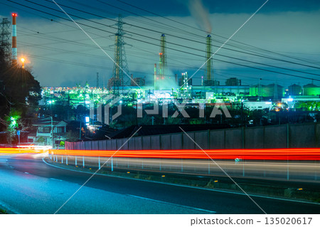 Dynamic factory night view created by trails of light Dynamic factory night view created by trails of light 135020617