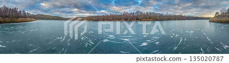 Aerial panorama of frozen lakes and forest near Frankfurt skyline 135020787