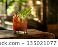 Bloody Mary Cocktail with Celery and Bacon on Rustic Wood 135021077