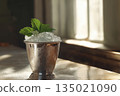 Mint Julep in Silver Cup with Crushed Ice and Mint 135021090
