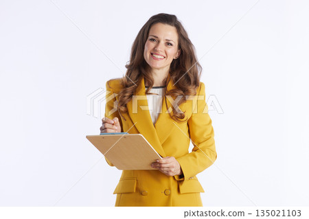 Friendly Businesswoman with Clipboard and Pen Friendly Businesswoman with Clipboard and Pen 135021103