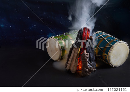 Campfire and two drums with smoke at night Campfire and two drums with smoke at night 135021161